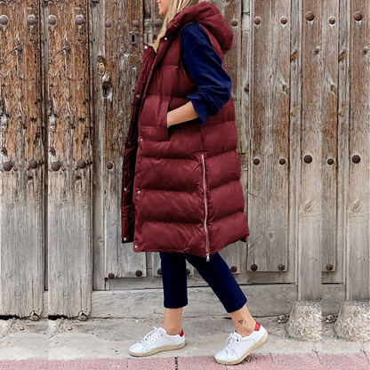 Gilet long matelassé femme – Gilet avec capuche tendance et chaud pour l'hiver